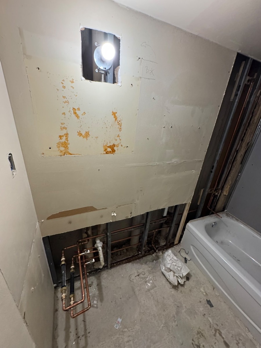 Bathroom plumbing rough-in during a renovation