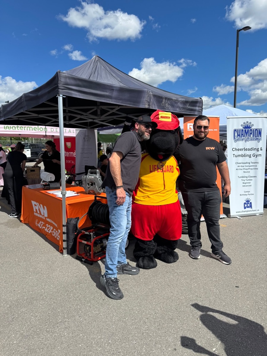 The Ridgewood Mechanical team at a community event booth
